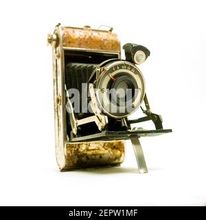 The vintage camera is displayed prominently against a clean background, highlighting its design and detailed mechanics Stock Photo