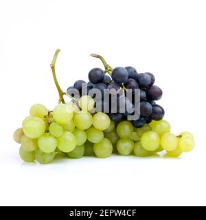 Bunches of red and white grapes on white background Stock Photo
