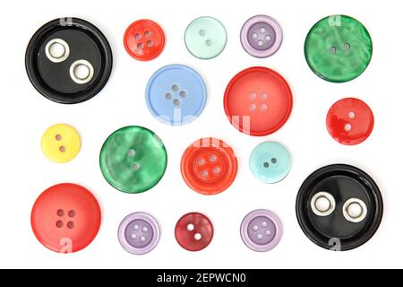 Set of different and colored sewing buttons, cut out and isolated on white background Stock Photo