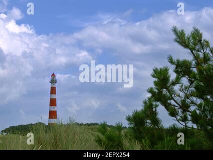Red and white lighthouse panorama on the Frisian island of Ameland Stock Photo