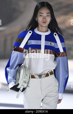 Model Hyun Ji Shin walks on the runway during the Louis Vuitton