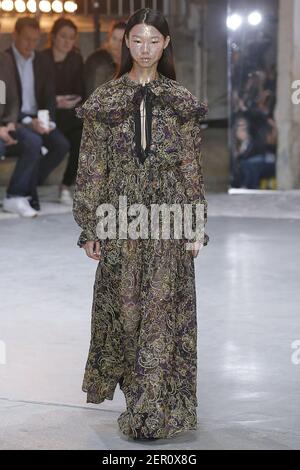 Model Yoon Young Bae walks on the runway during the Dior Fashion Show  during Paris Fashion