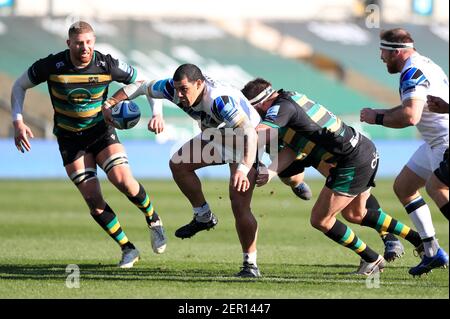 Bath's Josh Matavesi is tackled by Northampton Saints' Tom Wood (right) during the Gallagher Premiership match at Franklins Gardens, Northampton. Picture date: Sunday February 28, 2021. Stock Photo