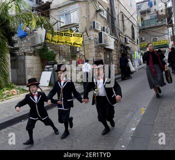 Jerusalem, Israel. 28th Feb, 2021. Ultra-Orthodox Jewish children dress in costumes to celebrate Purim in Mea Shearim in Jerusalem, on Sunday, March 28, 2021. Photo by Debbie Hill/UPI Credit: UPI/Alamy Live News Stock Photo