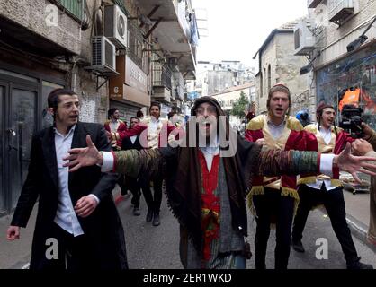 Jerusalem, Israel. 28th Feb, 2021. Ultra-Orthodox Jews dress in costumes to celebrate Purim in Mea Shearim in Jerusalem, on Sunday, March 28, 2021. Photo by Debbie Hill/UPI Credit: UPI/Alamy Live News Stock Photo