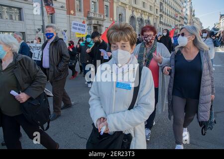 Madrid, Spain. 27th Feb, 2021. A detainee in the demonstration for public health in Madrid after a confrontation with an extreme right-wing group The National Police have arrested one of the protesters who have gathered this morning against the privatization of public health care after a confrontation with about ten members of the far-right group Bastion Frontal. (Photo by Alberto Sibaja/Pacific Press) Credit: Pacific Press Media Production Corp./Alamy Live News Stock Photo