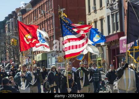 Veterans from branches of the military carry flags as they celebrate St. Patrick's Day at the 43rd Annual Irish-American Parade in the Park Slope neighborhood of Brooklyn in New York on Sunday, March 18, 2018. The family friendly event in the family friendly Park Slope neighborhood attracted hundreds of families as onlookers and marchers as it wound its way through the Brooklyn neighborhood. New York has multiple St. Patrick's Day Parades, at least one in each of the five boroughs. (Photo by Richard B. Levine)