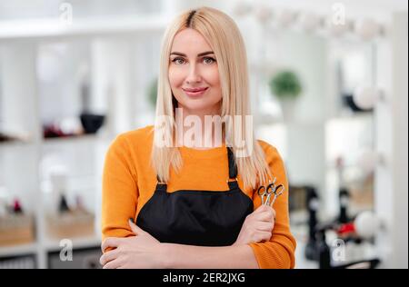 Portret of hairdresser in salon Stock Photo