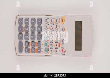 a large engineering calculator on white background Stock Photo