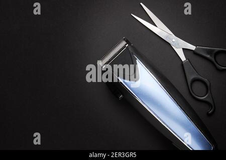 hairdressing tool over black background with copy space. view from above. studio shot Stock Photo