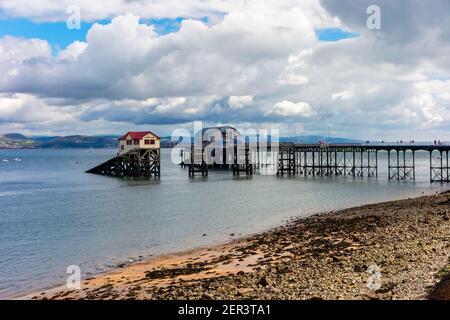 View over Swansea Bay and Mumbles Pier from Mumbles Beach on the south east coast of the Gower Peninsula near Swansea in South Wales UK Stock Photo