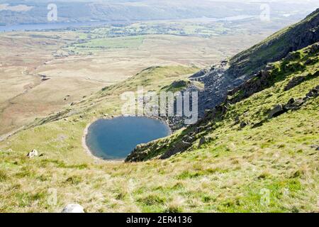 Blind Tarn blind Tarn Quarry and Coniston Water viewed from the ridge summit of Dow Crag Coniston the Lake District Cumbria England Stock Photo