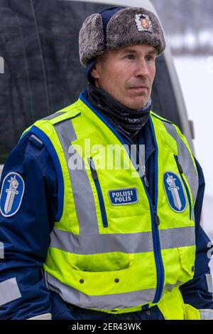 Finnish Police officers breathalysing drivers at random on a main road in north Finland Stock Photo