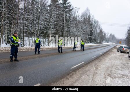 Finnish Police officers breathalysing drivers at random on a main road in north Finland Stock Photo