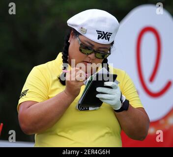 April 12 18 Christina Kim Checks Her Scorecard During The Second Round Of The Lpga Lotte Championship At The Ko Olina Golf Club In Kapolei Hi Michael Sullivan Csm Stock Photo Alamy