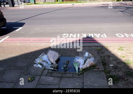 Floral tributes are left on the memorial stone of Stephen Lawrence on Well Hall Road, Eltham in London, UK on April 20, 2018 as the 25th anniversary of his murder approaches. (Photo by Claire Doherty/Sipa USA)