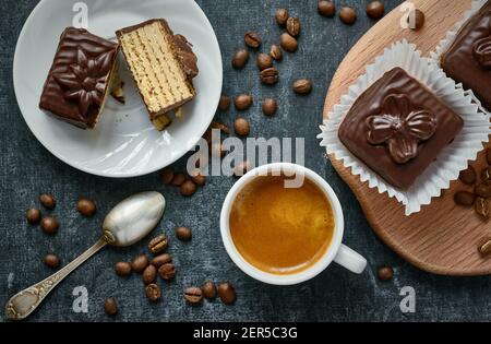 Cup of coffee and sweet chocolate waffle cakes, dessert, treats