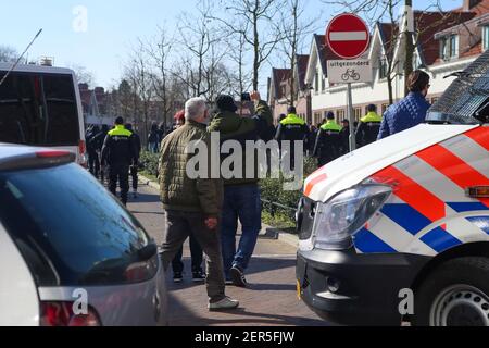 EINDHOVEN, NETHERLANDS - FEBRUARY 28: Police obstructing PSV fans to watch players arrive at stadium during the Dutch Eredivisie match between PSV and Stock Photo