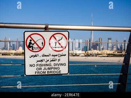 Dubai, UAE - 02.27.2021 Restriction sign on the bridge in Dubai city in both English and Arabic languages. Stock Photo