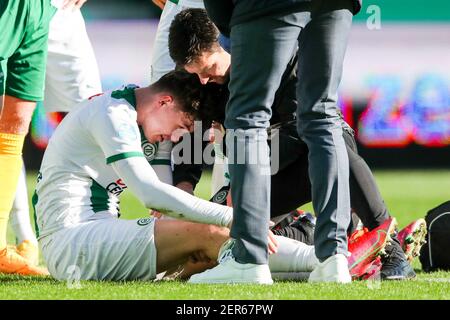 GRONINGEN, NETHERLANDS - FEBRUARY 28: Jorgen Strand Larsen of FC Groningen injured during the Dutch Eredivise match between FC Groningen and Fortuna S Stock Photo