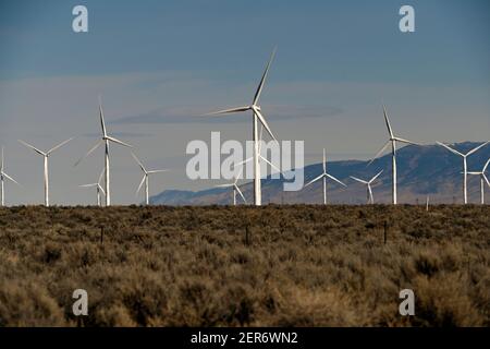 Ely, Nevada, USA. 26th Feb, 2021. Windmills are seen at Spring Valley Wind, Nevada's first wind farm on February 26, 2021. The farm is owned and operated by Pattern Energy. The facility is located in Spring Valley, northwest of Great Basin National Park and approximately 30 miles east of Ely, Nevada. The 152 megawatt project, built in 2012, uses 66 Siemens SWT-2.3-101 wind turbines and connects to the NV Energy transmission system. Credit: David Becker/ZUMA Wire/Alamy Live News Stock Photo