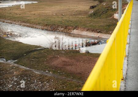 Sarajevo, Bosnia and Herzegovina - 28.02.2021: Pile of junk and plastic bottles in water Stock Photo