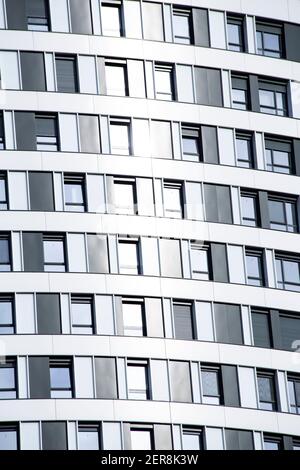 Modern residential building facade with windows and balconies ...
