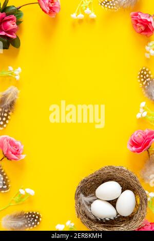 Easter arrangement on yellow background Stock Photo