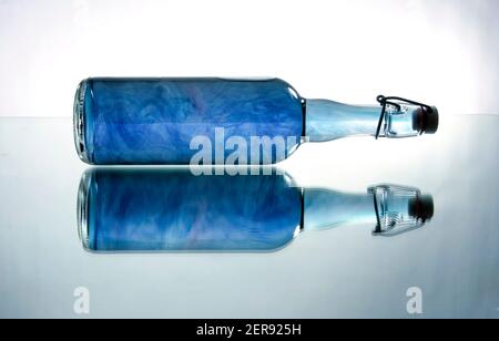 Color substance in bottle. Modern art. 3D rendering Stock Photo