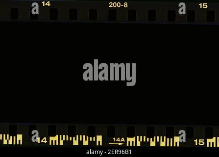 Film strip, blank photo frames, free space for your photo, real high-res 35mm film strip scan with signs of usage on bezel. blank old grunge film stri Stock Photo