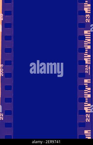 Film strip, blank photo frames, free space for your photo, real high-res 35mm film strip scan with signs of usage on bezel. blank old grunge film stri Stock Photo