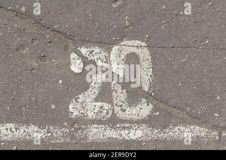 Number 20, twenty, painted on asphalt, running track Stock Photo