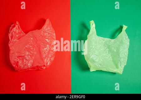 Crumpled plastic bags on red and green surface Stock Photo