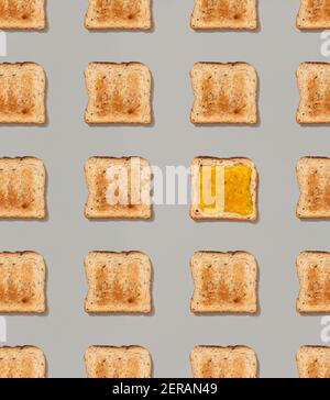 Pattern with toast and lemon jam on gray background Stock Photo