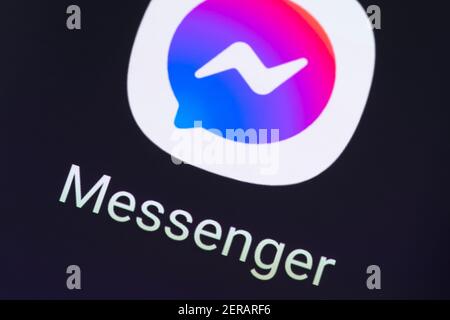 A macro closeup of the Facebook Messenger app on a smartphone screen. Facebook Messenger is a messaging app and platform developed by Facebook Stock Photo