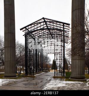 vintage iron trellis park entry gate Stock Photo