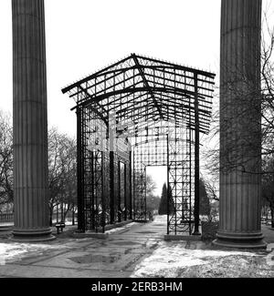 vintage iron trellis park entry gate Stock Photo