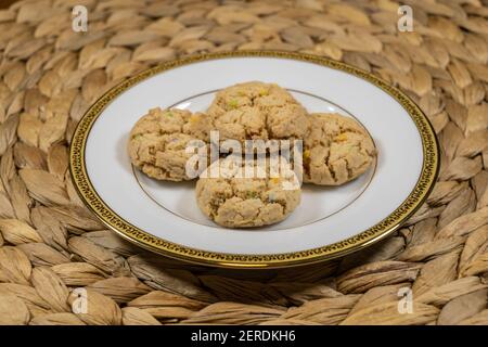 Gluten Free bake shop cookies are crispy and crunchy with chunks of ginger. Baked golden brown and rich with butter, these cookies are deliciously add Stock Photo