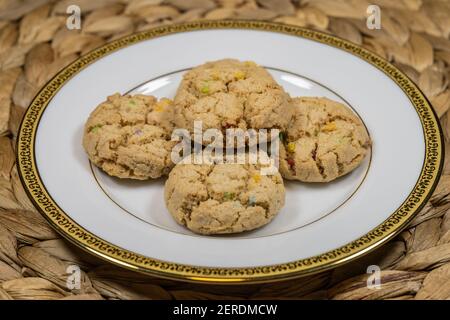 Gluten Free bake shop cookies are crispy and crunchy with chunks of ginger. Baked golden brown and rich with butter, these cookies are deliciously add Stock Photo