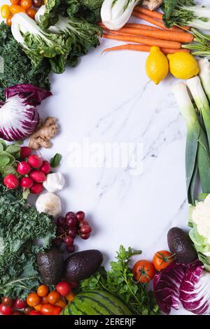 Prodcue on white marble background with room for text Stock Photo