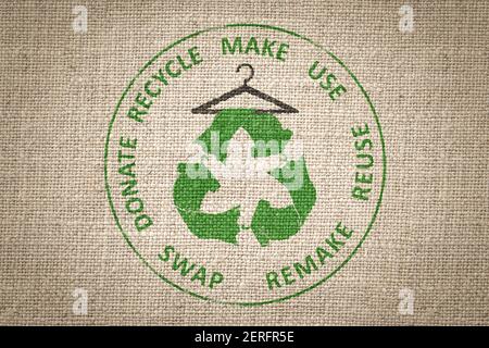 Circular Economy Textiles, make, use, reuse, swap, donate, recycle with eco clothes recycle icon on hanger sustainable fashion concept Stock Photo