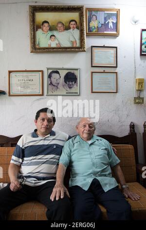Portrait of Tomás Garma Rodriguez (R), 87, a retired Pemex worker and his son Tomás Garma Mejia (L), 45 at their home in Villahermosa, Tabasco state, Mexico on June 18, 2018. (Photo by Bénédicte Desrus/Sipa USA)