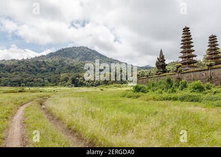 Balinese Hindu temple Pura Ulun Danu Tamblingan on lake Tamblingan. Buleleng, Bali, Indonesia. Stock Photo