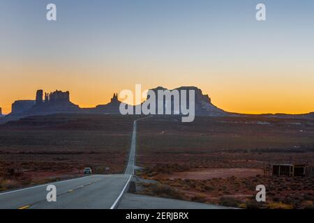 Rock formation of Monument Valley in evening backlight in winter Stock Photo