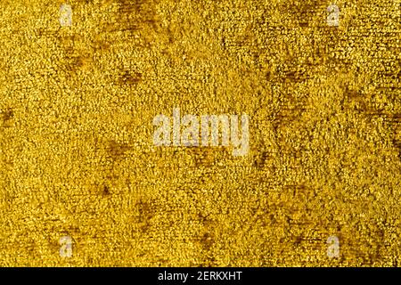 Soft cotton fabric carpet seamless texture background. Golden yellow color. High quality photo Stock Photo