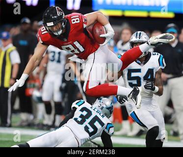 Atlanta Falcons tight end Austin Hooper (81) scores a touchdown as Arizona  Cardinals outside linebacker Haason Reddick (43) pursues during the second  half of an NFL football game, Sunday, Oct. 13, 2019