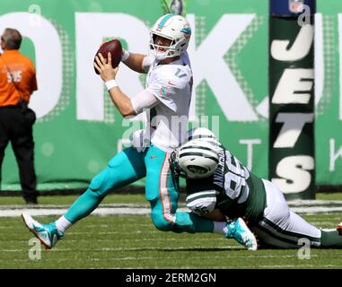 East Rutherford, New Jersey, USA. 13th Oct, 2019. Dallas Cowboys  quarterback Dak Prescott (4) gets stopped on fourth down by New York Jets  safety Jamal Adams (33) and defensive end Henry Anderson (