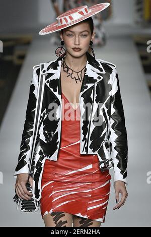 MILAN - SEPTEMBER 20: Woman with Louis Vuitton brown bag and black leather  jacket before Alberto Zambelli fashion show, Milan Fashion Week street styl  Stock Photo - Alamy