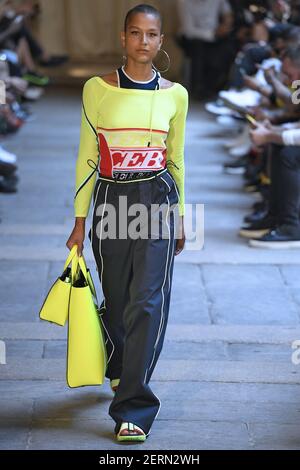 MILAN - SEPTEMBER 21: Woman with Prada velvet bag in green, blue and yellow  colors before Prada fashion show, Milan Fashion Week street style on Septe  Stock Photo - Alamy