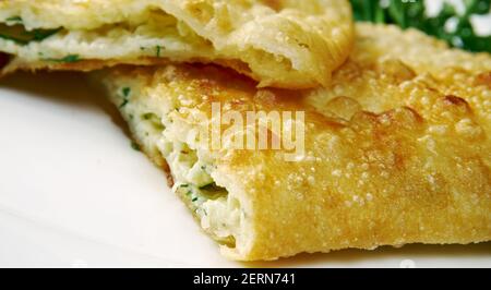 Norwegian pierogi - Savoury pies with Jarlsberg cheese and ham Stock Photo